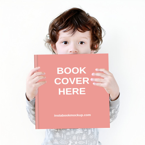 bright kid holding picture book